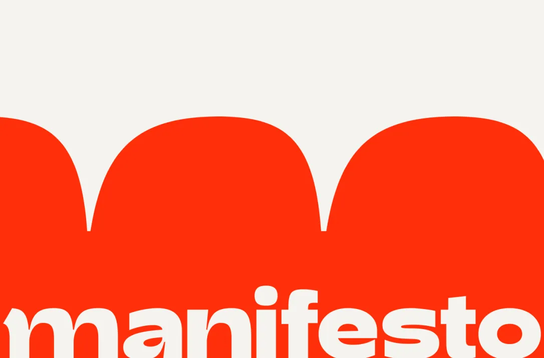 The manifesto logo in off white against the red block m shape